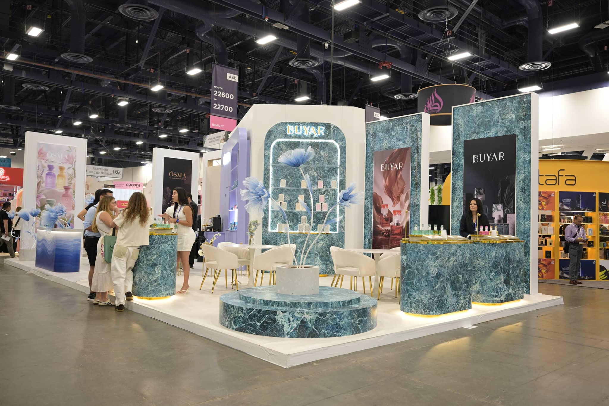 Wide view of the BUYAR fragrance booth on the trade show floor